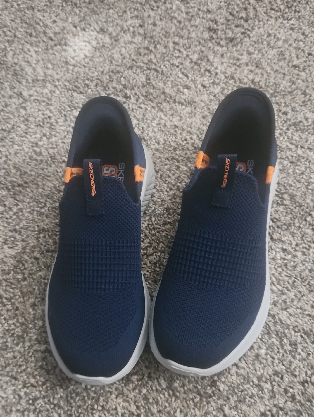 Skechers Kids Navy Slip-On Sneakers with Orange Pull Tabs